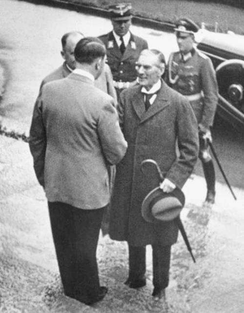 Hitler meets Chamberlain in 1938.